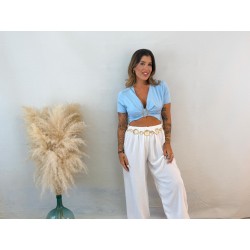 Top broche celeste