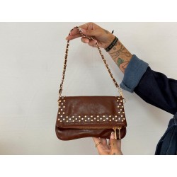Bolso polipiel tachas