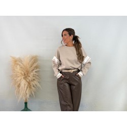 Sudadera volante beige